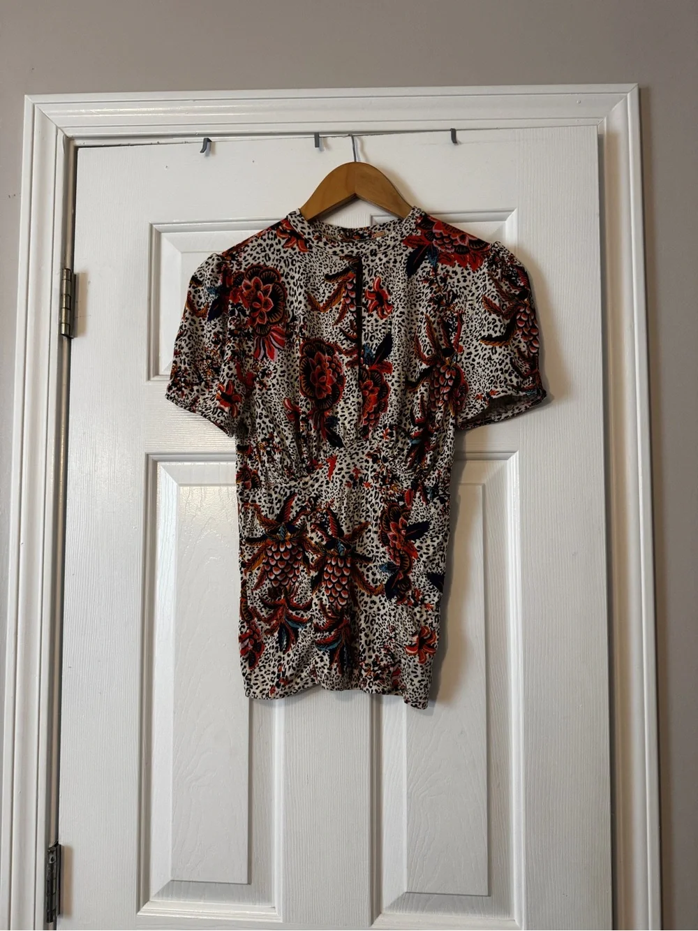 Free People Hear Me Roar Top Animal Floral Print Keyhole NWOT Medium
